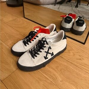Off-White Cream and Black Sneakers with Red Tag